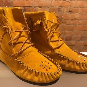Raw leather moccasin style boot/shoe